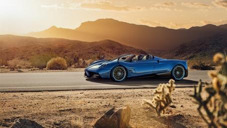 Dream Roadster in a Scenic Landscape Sunset wallpaper