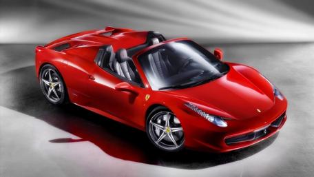 Sleek Red Ferrari Sports Car Wallpaper wallpaper