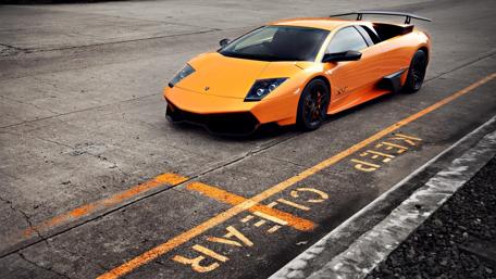 Bold Lamborghini Murcielago in Stunning Orange Finish wallpaper