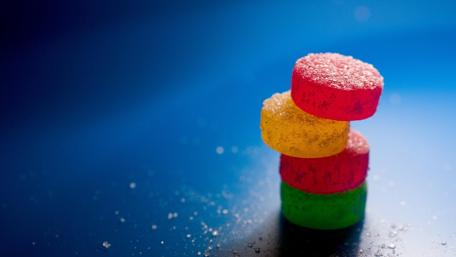 Colorful Candy Stacked Delightfully wallpaper