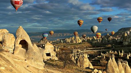 Balloons Over Cappadocia's Unique Landscape in Turkey wallpaper
