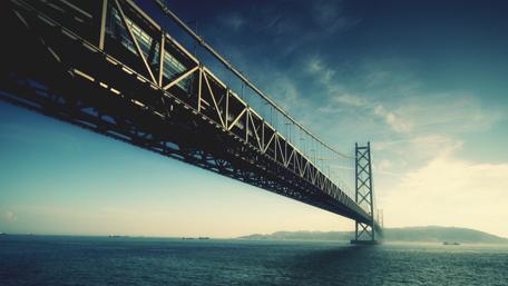 Majestic Bridge Over Serene Waters wallpaper