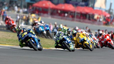 Thrilling Speed on the Racetrack wallpaper
