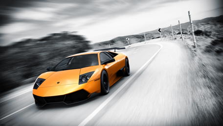 Vibrant Lamborghini on a Serene Open Road wallpaper
