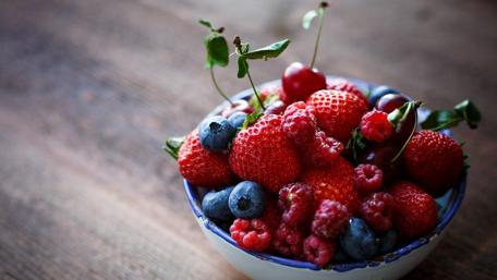 Fresh Berry Delight in a Bowl wallpaper