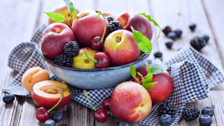 Vibrant Fruit Medley in a Bowl wallpaper