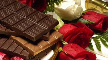 Indulgent Chocolate and Romantic Roses Showcase wallpaper