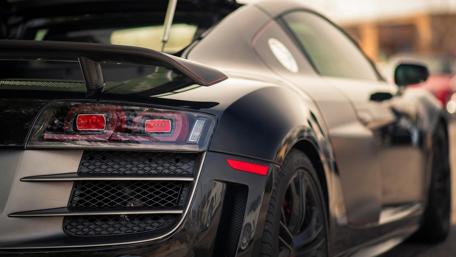 Sleek Black Audi R8 Rear View Wallpaper wallpaper