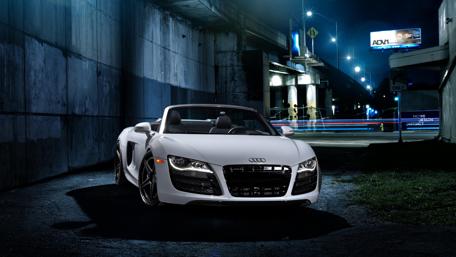 Sleek Audi R8 Spyder in Urban Nightscape wallpaper