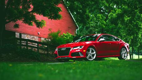 Red Audi RS7 in Scenic Countryside wallpaper