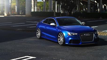 Elegant Azure Audi RS5 Elegance on Asphalt wallpaper