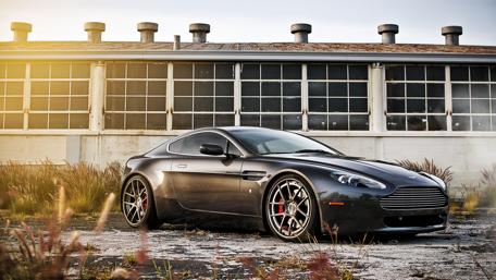 Sleek Aston Martin in Urban Setting wallpaper