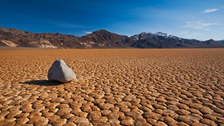 Stunning Desert Landscape Under a Clear Blue Sky wallpaper