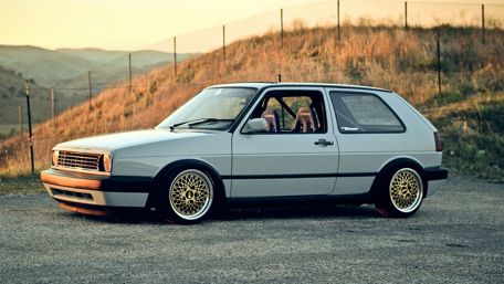 Classic Volkswagen Golf in Sunset Hues wallpaper