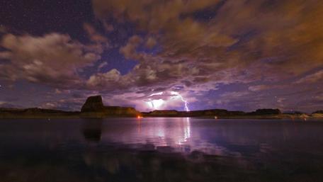 Electric Sky Over Serene Waters wallpaper