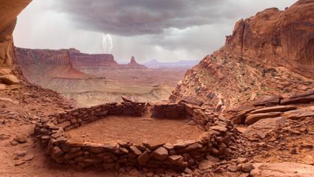 Majestic Desert Canyon Under Stormy Skies wallpaper