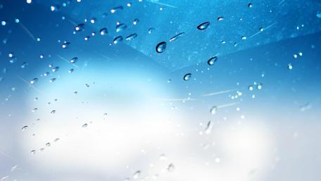 Glittering Drops on a Dreamy Blue Background wallpaper
