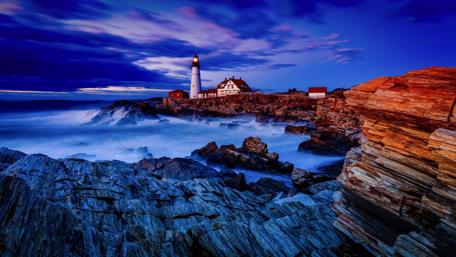 Guiding Light Amidst the Crashing Waves wallpaper