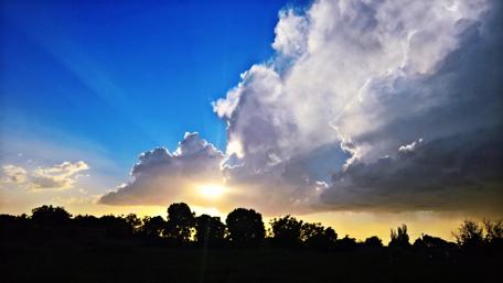 Serene Sunset Over Nature's Landscape wallpaper