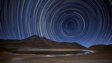 Star Trails Over Mountain Lake wallpaper
