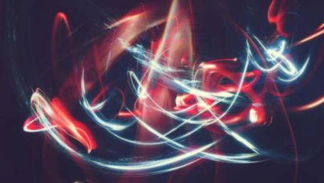 Whirling Light Trails in Dark Space wallpaper