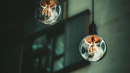 Warm Glow of Hanging Lights wallpaper