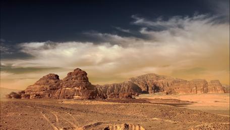 Majestic Desert Landscape with Dramatic Clouds wallpaper