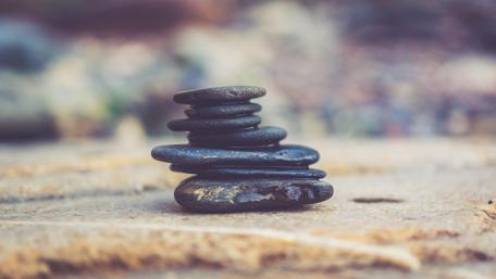 Balanced Stones Creating Harmony in Nature wallpaper