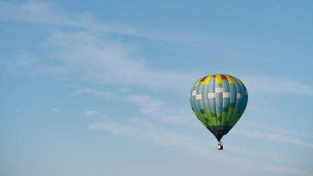 Colorful Hot Air Balloon Soaring in the Sky wallpaper