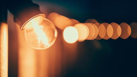 Glowing Light Bulb in Soft Focus wallpaper