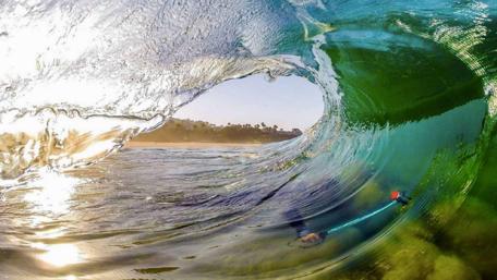 Rolling Waves Embrace Nature's Beauty wallpaper