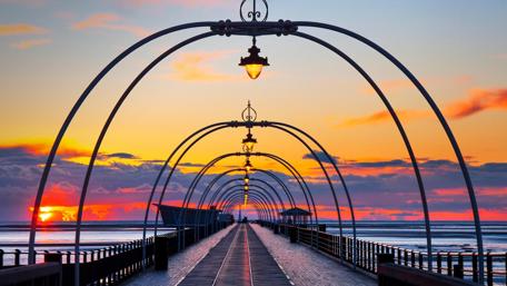Sunset Stroll on Ocean Pier wallpaper