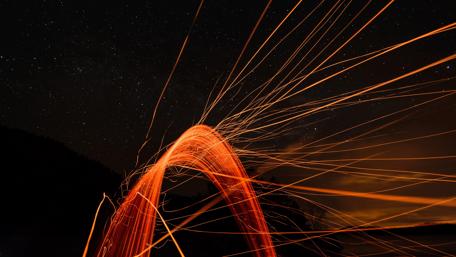 Dancing Lights Under a Starry Sky wallpaper