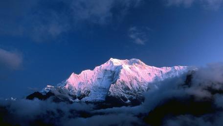 Snow-Capped Himalayan Peak at Sunset wallpaper