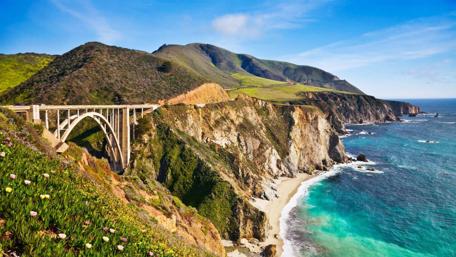 Breathtaking Coastal Viaduct Overlooking Serene Waters wallpaper