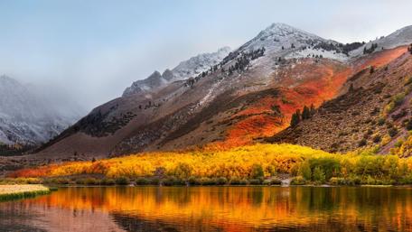 Majestic Autumn Reflection in Serene Mountains wallpaper