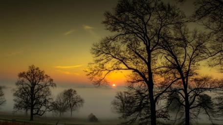 Twilight Serenity Over Misty Fields wallpaper
