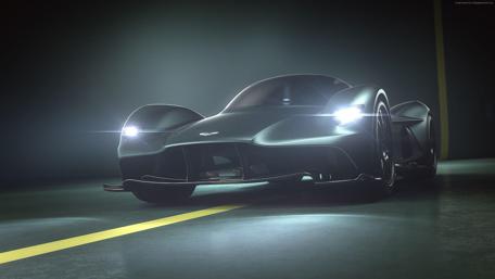 Sleek Aston Martin Supercar in Dramatic Lighting wallpaper