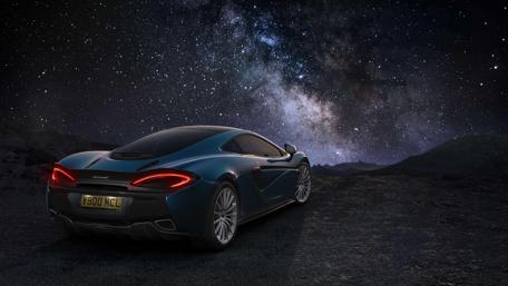 Stellar Ride Under The Cosmic Sky wallpaper