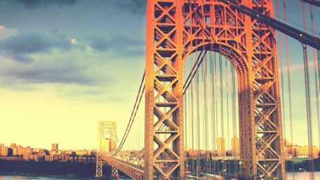 Golden Glow Over City Bridge Scene wallpaper