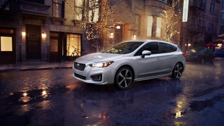 Sleek Car in Rainy Celebration Scene wallpaper