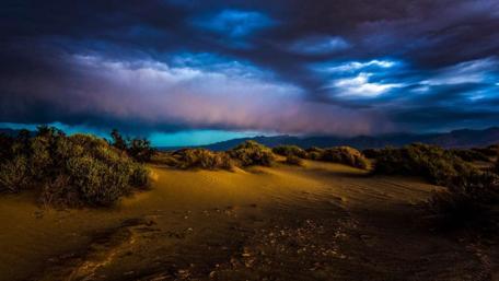 Stormy Skies Over Golden Sands wallpaper