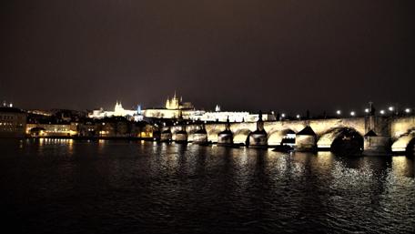 Prague's Enchanting Nightscape Over Charles Bridge wallpaper