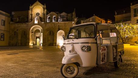 Vintage Car in Magical Night Setting wallpaper