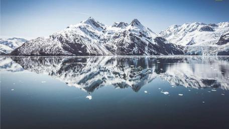 Majestic Arctic Reflections in Snowy Mountains wallpaper