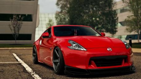 Bold Red Nissan 370Z Dream Car Wallpaper wallpaper