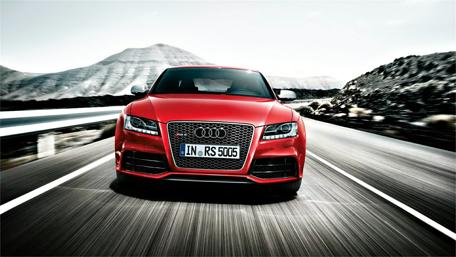 Sleek Audi RS5 on a Mountain Road wallpaper