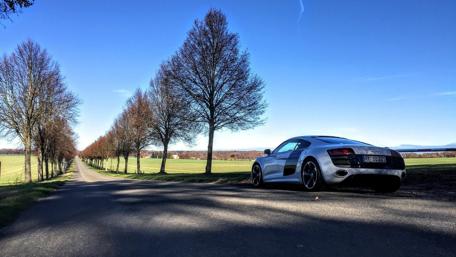 Sleek Audi R8 on a Scenic Country Road wallpaper