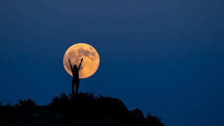Full Moon Triumph at the Peak wallpaper