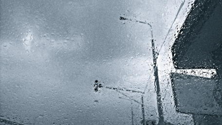 Urban Rainy Day View Through a Window wallpaper